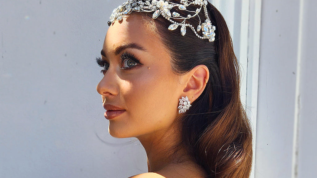bride with statement crystal headpiece - sleek sides with soft hollywood waves