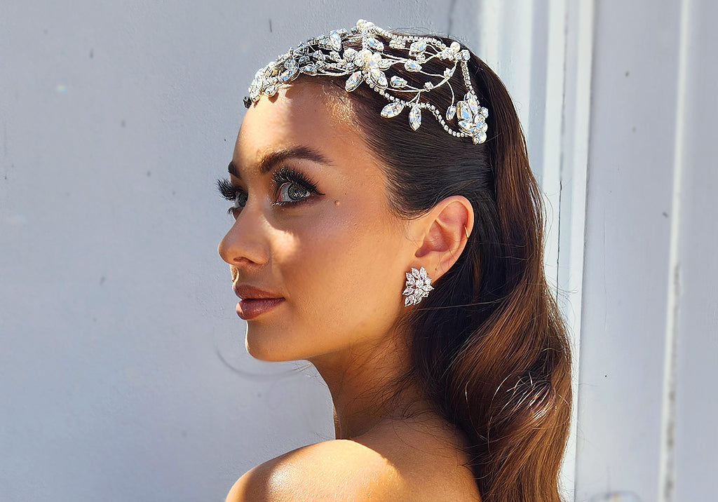 bride with statement crystal headpiece - sleek sides with soft hollywood waves