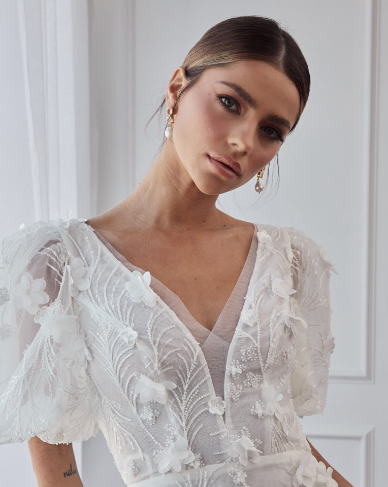 double quartz gemstone with baroque pearl earrings by Lola Knight - at Kezani - on model with hair in a bun - front view