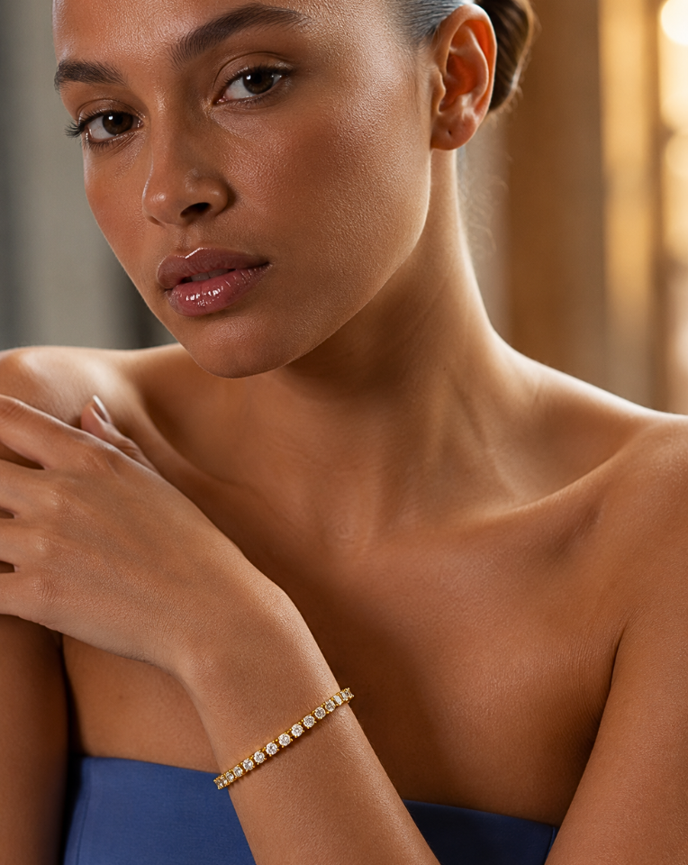 dark hair girl wearing 4mm tennis bracelet in gold for kezani jewellery