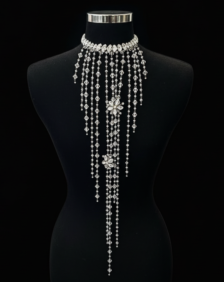 statement crystal necklace falling down the back of a black mannequin