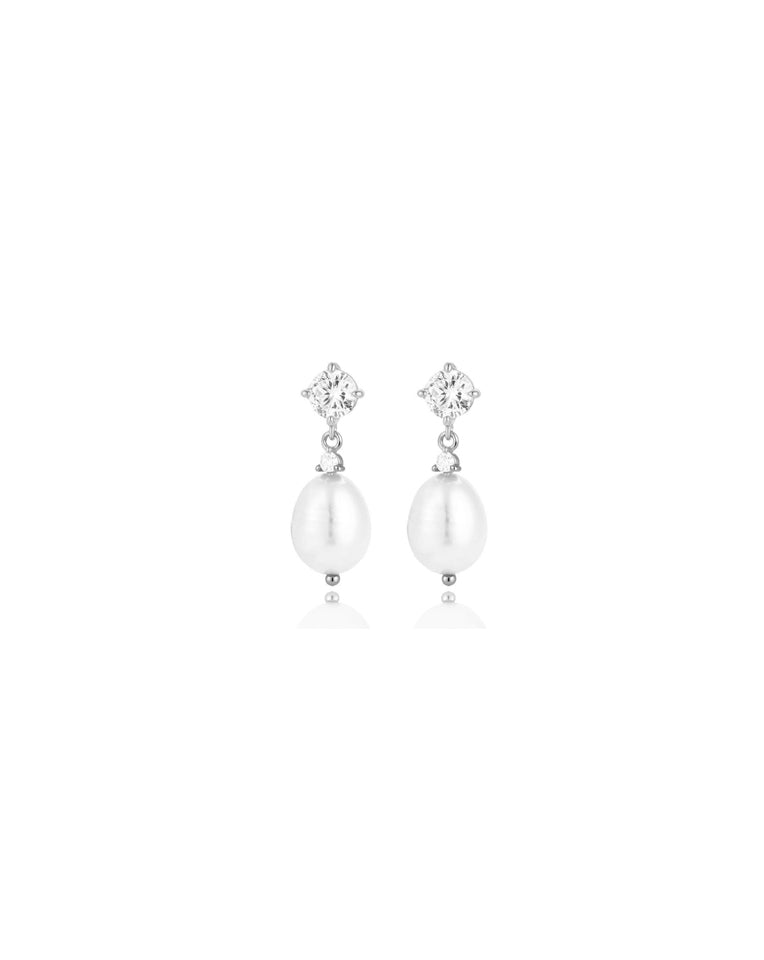 close up of dainty brooklyn earrings in silver on white background - kezani jewellery