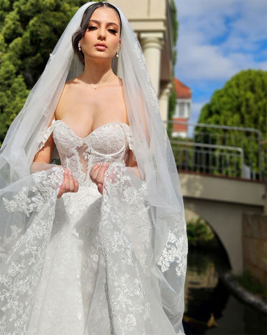 stunning nicole milano gown - corset lace off shoulder with dramatic chiara veil with deep lace borders and italian tulle - 3.5metres long - Chiara wedding veil at Kezani