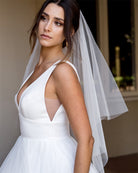 wedding and bridal veils - raw edge with  two tiers - fingertip - side view - Emma at Kezani
