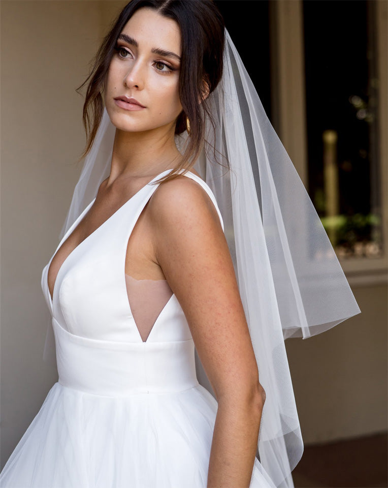 wedding and bridal veils - raw edge with  two tiers - fingertip - side view - Emma at Kezani
