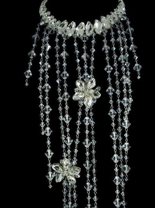 crystal choker with crystal chains and floral crystal brooches