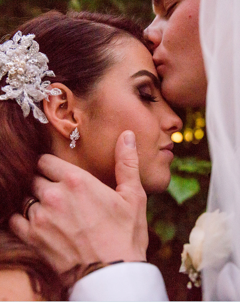 bridal earrings - real bride wearing Queenie earring by Stephanie Browne - small crystal earring with pear drop at Kezani
