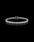crystal 4mm tennis bracelet on a black background