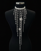 statement crystal necklace falling down the back of a black mannequin