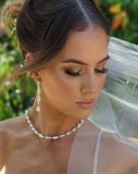 wedding and bridal earrings - baroque pearl and crystal long drop earrings - Nikola by Kezani on model