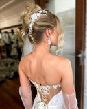 soft kim k updo with blonde hair - wearing pearl and lace luxury hair vine and pearl pin with pearl flower earrings - galia lahav gown and tulle gloves - side back view