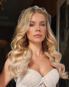 wedding birdcage veil with scattered pearl and crystals on model with glam wave hair