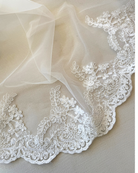 close up of corded border lace detail on Mia short mantilla wedding veil by Kezani