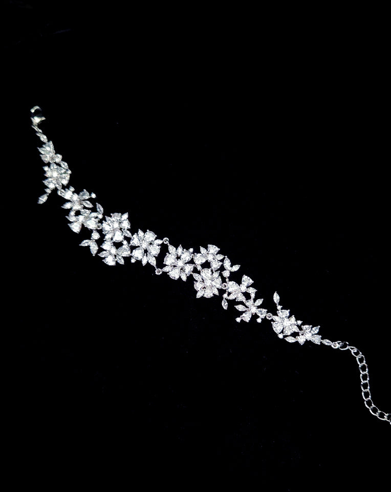bridal and wedding bracelet with delicate crystal flowers by Stephanie Browne at Kezani