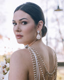 wedding and bridal earrings - Mother of pearl pear drop - Mae by Stephanie Browne at Kezani - on model