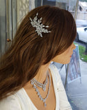 bridal and formal headpiece - flower cascade marquise crystal branch side comb on model at Kezani